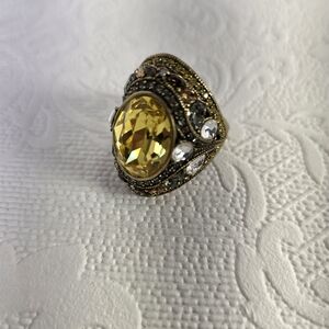 Heidi Daus Bronze Ring With Large Gold Stone Center And Multi Color Rhinestones